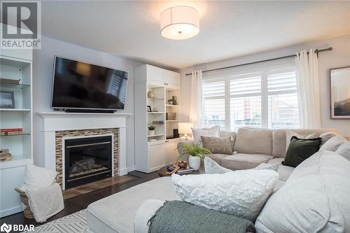 Snuggle up by the fire - 988 Clark Boulevard, Milton, ON - Indoor With Fireplace