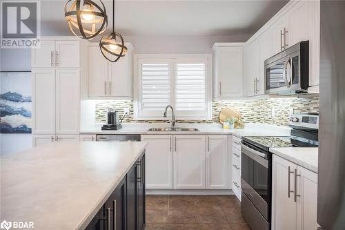 Stainless steel appliances - 988 Clark Boulevard, Milton, ON - Indoor Photo Showing Kitchen With Double Sink With Upgraded Kitchen