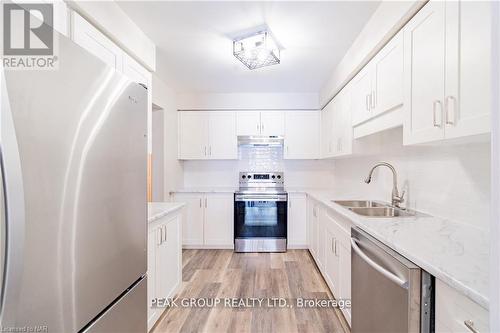 4 - 5150 Dorchester Road, Niagara Falls (212 - Morrison), ON - Indoor Photo Showing Kitchen With Stainless Steel Kitchen With Double Sink With Upgraded Kitchen