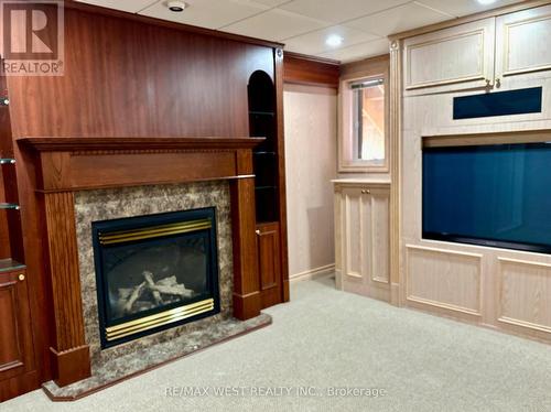 Bsmt - 463 Hewitt Circle, Newmarket, ON - Indoor Photo Showing Other Room With Fireplace