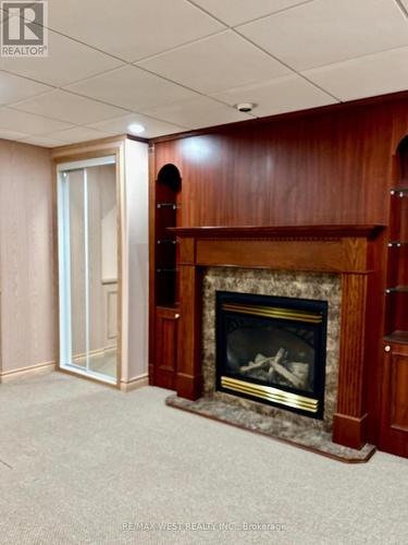 Bsmt - 463 Hewitt Circle, Newmarket, ON - Indoor Photo Showing Living Room With Fireplace