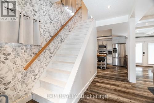 Stairs in open concept kitchen, living,dining room - 85 Dufferin Street, Stratford, ON - Indoor Photo Showing Other Room