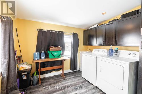 Well lit purpose built main lvl laundry room addon - 85 Dufferin Street, Stratford, ON - Indoor Photo Showing Laundry Room