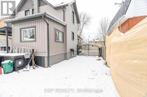 Side yard view from backyard facing driveway - 85 Dufferin Street, Stratford, ON - Outdoor With Exterior