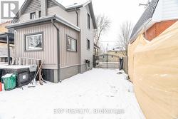 Side yard view from backyard facing driveway - 