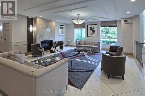 619 - 30 North Park Road, Vaughan, ON - Indoor Photo Showing Living Room With Fireplace