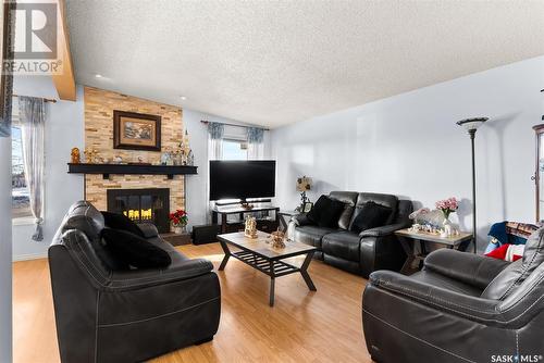 337 Mccarthy Boulevard N, Regina, SK - Indoor Photo Showing Living Room With Fireplace