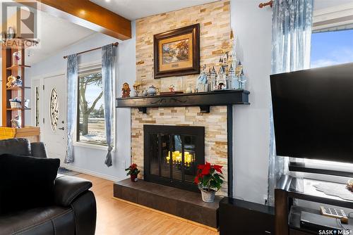 337 Mccarthy Boulevard N, Regina, SK - Indoor Photo Showing Living Room With Fireplace