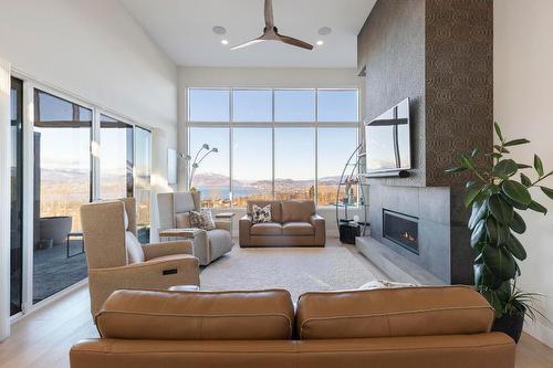 484 Sparrow Hawk Court, Kelowna, BC - Indoor Photo Showing Living Room With Fireplace