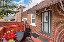 Doorway to property featuring a wooden deck - 