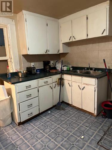 585-587 Aylmer Street N, Peterborough (Downtown), ON - Indoor Photo Showing Kitchen With Double Sink