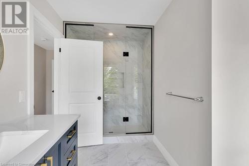 Bathroom featuring vanity and a shower with shower door - 3C Balsam Street, Innerkip, ON - Indoor Photo Showing Bathroom