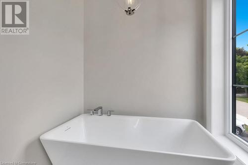 Bathroom with a bathing tub - 3C Balsam Street, Innerkip, ON - Indoor Photo Showing Bathroom