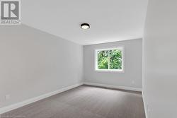 Unfurnished room featuring carpet floors - 