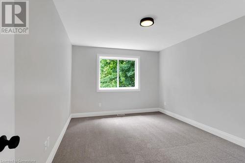 View of carpeted spare room - 3C Balsam Street, Innerkip, ON - Indoor Photo Showing Other Room