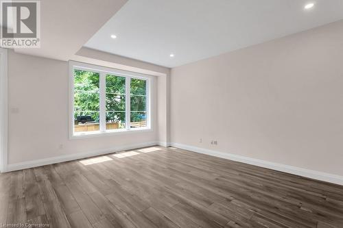 Spare room featuring hardwood / wood-style floors - 3C Balsam Street, Innerkip, ON - Indoor Photo Showing Other Room