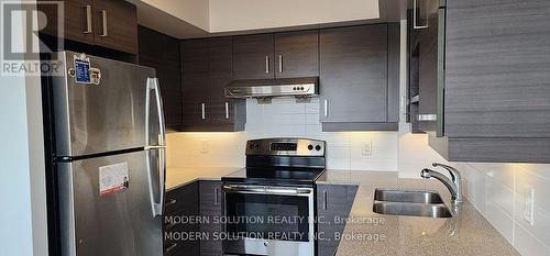 718 - 8200 Birchmount Road, Markham, ON - Indoor Photo Showing Kitchen With Stainless Steel Kitchen With Double Sink