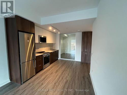 418 - 1787 St. Clair Avenue W, Toronto, ON - Indoor Photo Showing Kitchen With Stainless Steel Kitchen