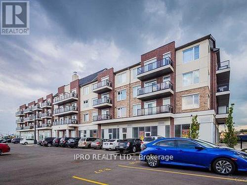 217 - 58 Sky Harbour Drive, Brampton, ON - Outdoor With Balcony With Facade