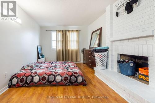 30 Rodwell Court, Brampton, ON - Indoor Photo Showing Bedroom With Fireplace