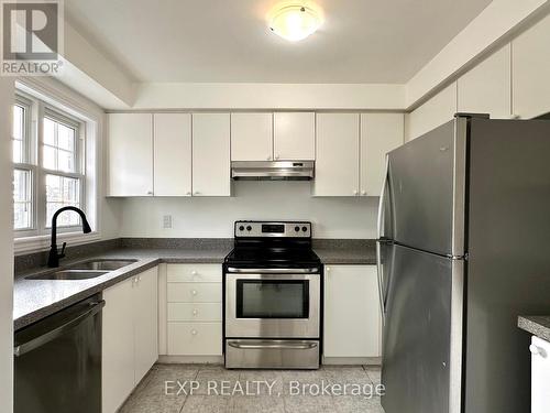 35 - 6060 Snowy Owl Crescent, Mississauga, ON - Indoor Photo Showing Kitchen With Double Sink