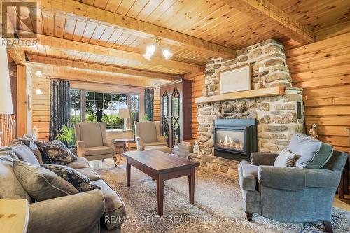 6758 Newton Road E, Champlain, ON - Indoor Photo Showing Living Room With Fireplace