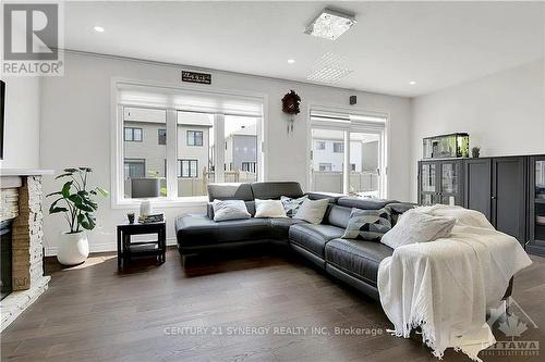 402 Cope Drive, Ottawa, ON - Indoor Photo Showing Living Room With Fireplace