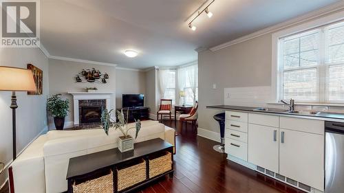 129 Lemarchant Road Unit#A, St. John'S, NL - Indoor Photo Showing Kitchen With Fireplace With Double Sink