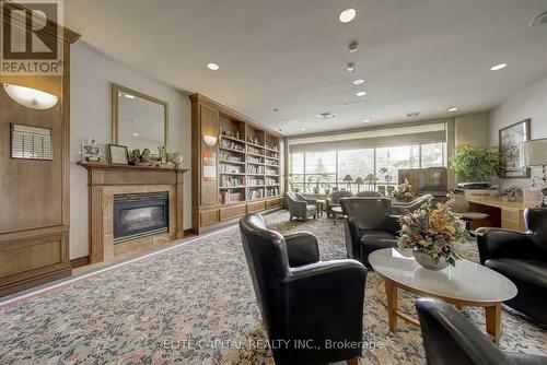 Ph8 - 3088 Kennedy Road, Toronto, ON - Indoor Photo Showing Living Room With Fireplace