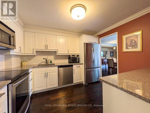 608 - 1400 Dixie Road, Mississauga, ON - Indoor Photo Showing Kitchen