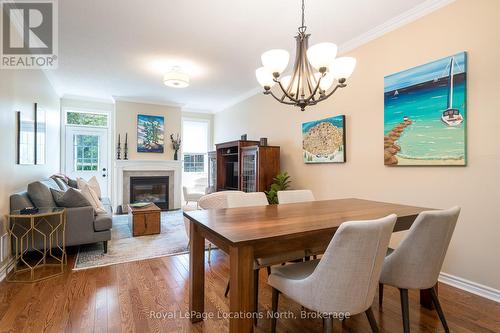 19 - 110 Napier Street, Blue Mountains (Thornbury), ON - Indoor Photo Showing Dining Room With Fireplace