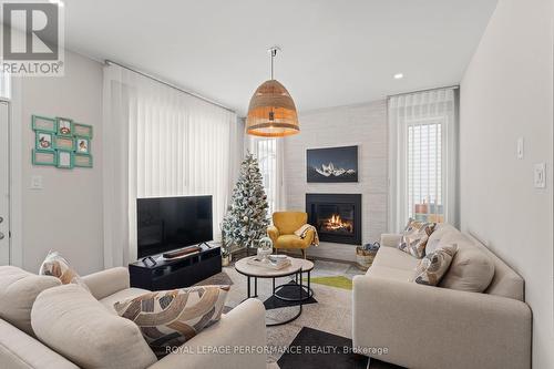 108 Rugosa Street, Ottawa, ON - Indoor Photo Showing Living Room With Fireplace