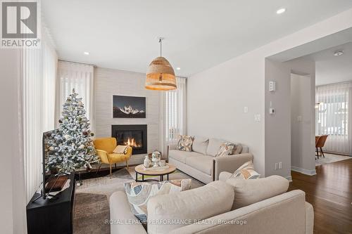 108 Rugosa Street, Ottawa, ON - Indoor Photo Showing Living Room With Fireplace