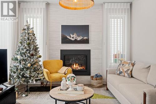 108 Rugosa Street, Ottawa, ON - Indoor Photo Showing Living Room With Fireplace