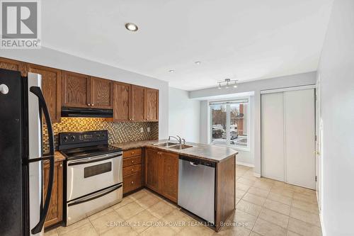 19 - 2342 Bois Vert Place, Ottawa, ON - Indoor Photo Showing Kitchen With Double Sink