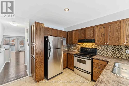 19 - 2342 Bois Vert Place, Ottawa, ON - Indoor Photo Showing Kitchen With Double Sink