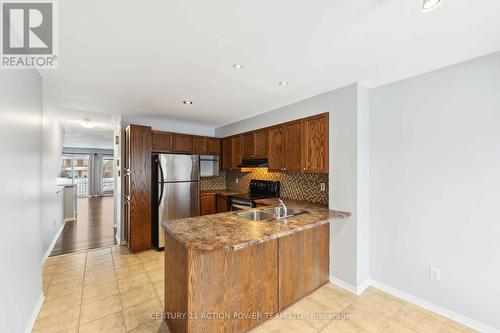 19 - 2342 Bois Vert Place, Ottawa, ON - Indoor Photo Showing Kitchen With Double Sink