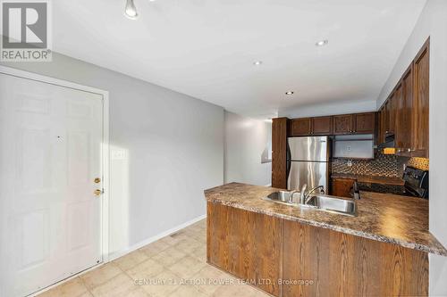 19 - 2342 Bois Vert Place, Ottawa, ON - Indoor Photo Showing Kitchen With Double Sink