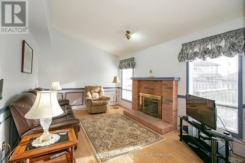 40 Rocky Mountain Crescent, Brampton, ON - Indoor Photo Showing Living Room With Fireplace