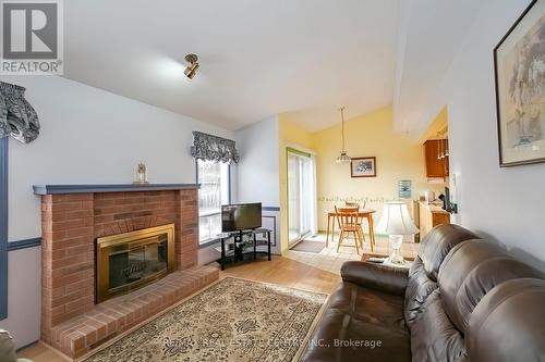 40 Rocky Mountain Crescent, Brampton, ON - Indoor Photo Showing Living Room With Fireplace