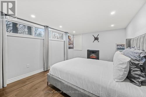 2401 St Frances Drive, Burlington, ON - Indoor Photo Showing Bedroom With Fireplace