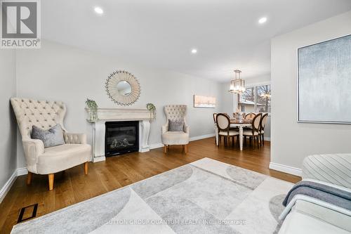 2401 St Frances Drive, Burlington, ON - Indoor Photo Showing Living Room With Fireplace