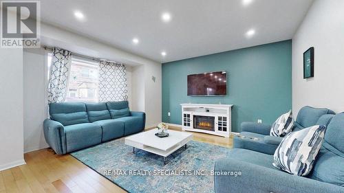 13 Degrassi Cove Circle, Brampton, ON - Indoor Photo Showing Living Room With Fireplace