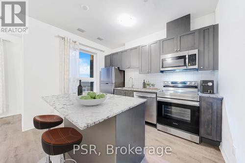 202 - 3285 Carding Mill Trail, Oakville, ON - Indoor Photo Showing Kitchen With Upgraded Kitchen