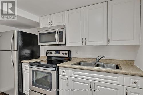 223 Mcclennan Street, Peterborough (Northcrest), ON - Indoor Photo Showing Kitchen With Double Sink