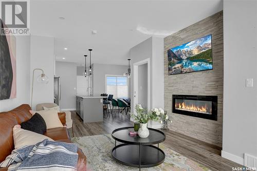 5508 Nicholson Avenue E, Regina, SK - Indoor Photo Showing Living Room With Fireplace