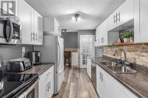 74 Pozzebon Cres, Sault Ste. Marie, ON - Indoor Photo Showing Kitchen With Double Sink