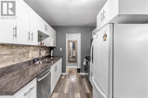 74 Pozzebon Cres, Sault Ste. Marie, ON - Indoor Photo Showing Kitchen With Double Sink