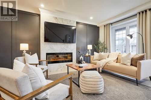 1057 Rippingale Trail, Peterborough (Northcrest), ON - Indoor Photo Showing Living Room With Fireplace