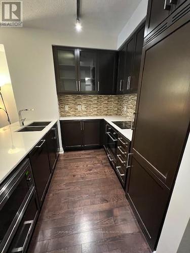 214 - 21 Clairtrell Road, Toronto, ON - Indoor Photo Showing Kitchen With Double Sink With Upgraded Kitchen